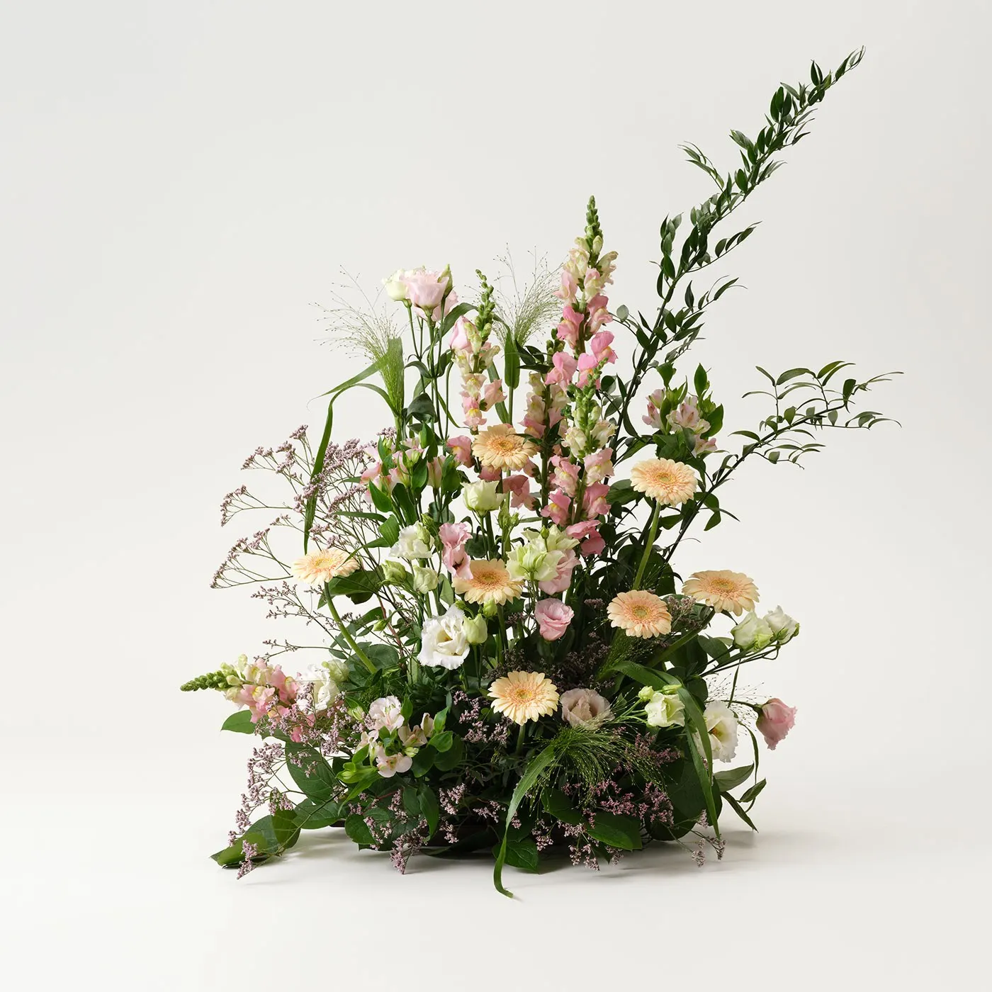 Funeral arrangement in pink
